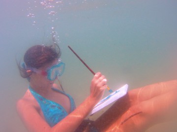 Practicing underwater oil painting technique in Bali sea
