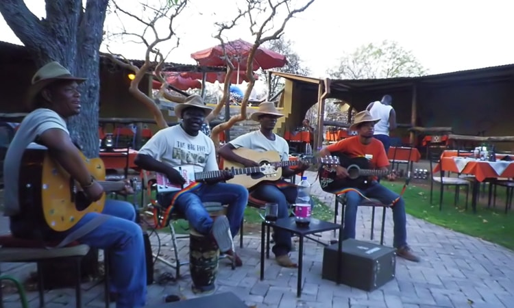 People playing music, Etosha Sarafi Lodge, Namibia